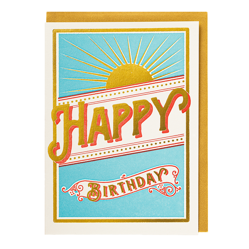Birthday card with gold 'Happy Birthday' text and sun design on a blue background
