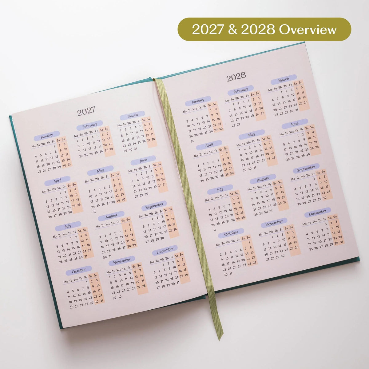 Open diary showing 2027 and 2028 month by month overview against a white background