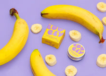Bananas and sliced fruit highlighting the flavour of the lip balm.