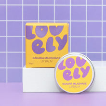 Lovely banana milkshake lip balm with packaging on a purple grid background