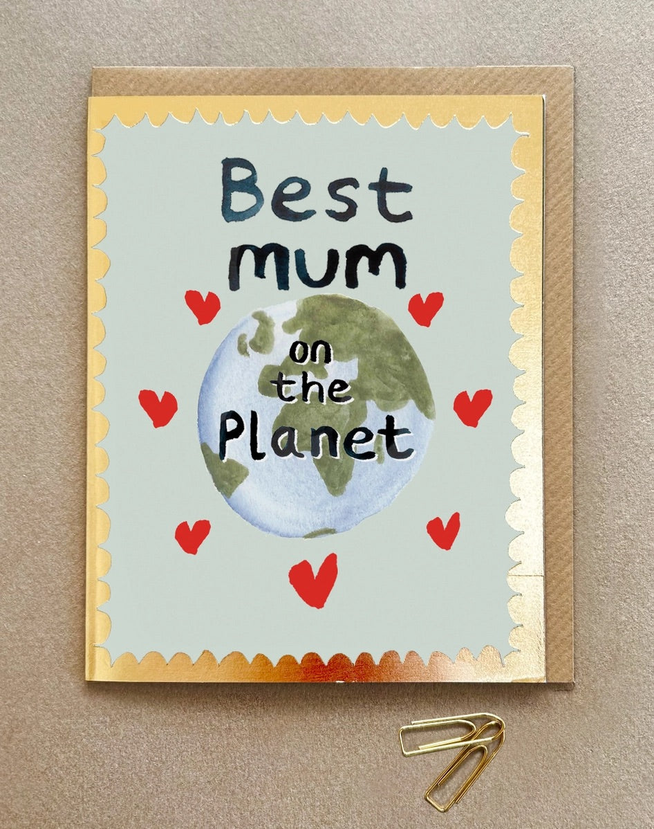 Greeting card with 'Best mum on the Planet' text and Earth illustration on a beige background.