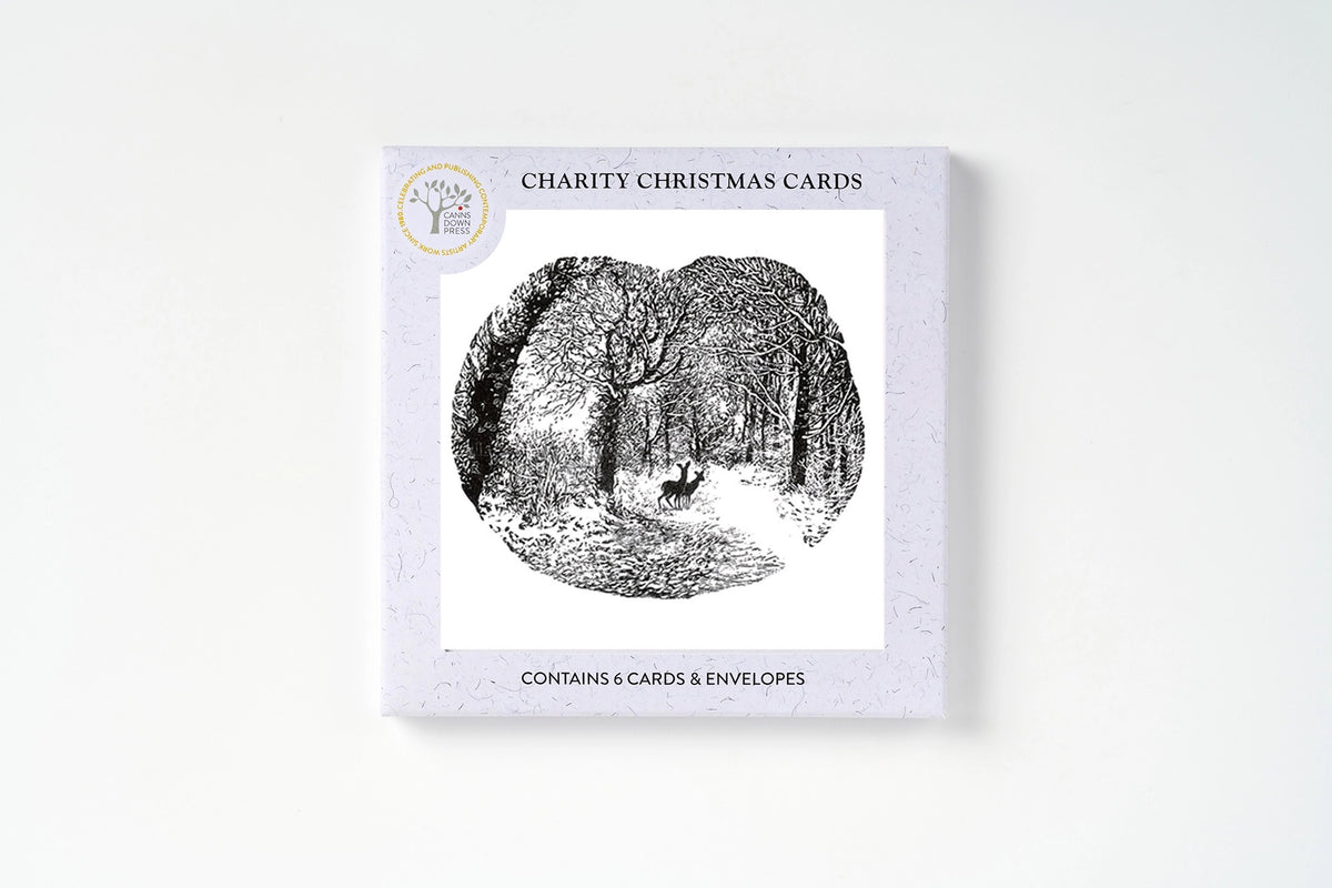 6 Charity Christmas Cards boxed featuring a black and white forest illustration with a deer, shown on a clean white background.