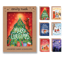 Set of Christmas cards with a box labeled 'Emily Nash' featuring various holiday designs.