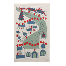 Decorative tea towel with a Christmas-themed village design on a white background