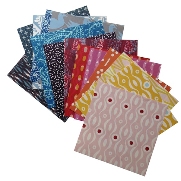 Collection of patterned paper sheets on a white background