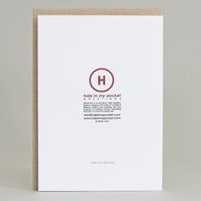 Reverse of greeting card with a red 'H' logo and text on a white background