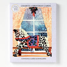 Charity Christmas Cards featuring an illustration of a Dalmatian rocking horse by a snowy window.