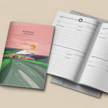 An illustrated running logbook shown closed and open on a light beige background. The closed cover features a pink sky, green landscape, and the title 'RUNNING LOGBOOK.