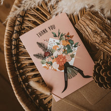 Pink 'Thank You' card with a floral bouquet displayed in an autumanl basket.