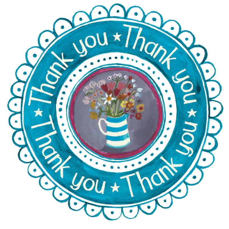 Thank you card with the wording 'Thank You' arranged circular in a wreath surrounding a nice jug of flowers.