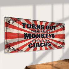 Decorative sign with text 'Turns out these are my monkeys & this is my circus' on a red and white striped background.