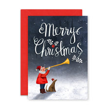 Christmas card with a person in a red coat and hat blowing a horn, accompanied by a dog, on a snowy background.