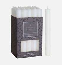 Shearer Candles packaging with white candles on a white background