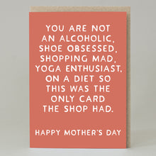 Mother's Day card with humorous text on a coral background